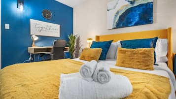 1 bedroom, desk, iron/ironing board, travel crib