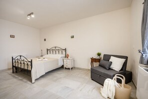 1 habitación, tabla de planchar con plancha, wifi y ropa de cama 