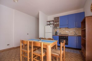 Dining - GuestHost - Cozy apartment of 60 sqm located on the first floor of a building WITHOUT a lift (stairs to access), can accommodate up to 2 people.The property is situated in an area provided by all the main services: bars, restaurants, supermarkets, pharma (Olbia)