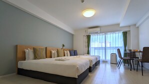 A hotel room with a large bed, a desk, and a chair. - ESLEAD HOTEL Namba South 2 (Osaka)