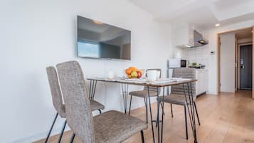 Premium Quadruple Room, City View | Premium bedding, blackout drapes, WiFi (free), bed sheets