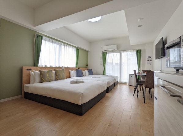 Premium bedding, blackout curtains, free WiFi, bed sheets