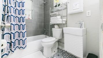 Hair dryer, towels, soap, shampoo