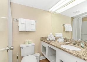 Hair dryer, towels, soap, shampoo