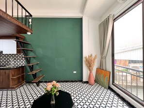 Deluxe Studio | Living area | TV - NINE HOUSING 82 Kim Ma (Hanoi)