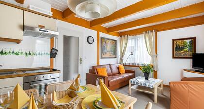 Ferienwohnung 'Atlanta 103' mit gemeinsamer Terrasse, privatem Garten und WLAN