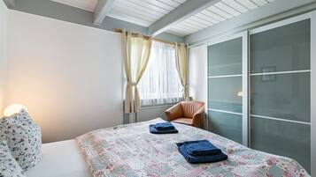 1 habitación, tabla de planchar con plancha, wifi gratis y ropa de cama