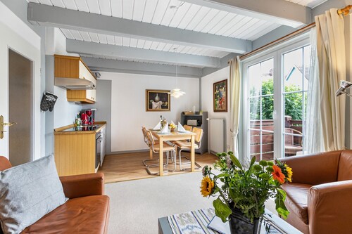 Ferienwohnung 'Atlanta 104' mit gemeinsamer Terrasse, privatem Garten und WLAN