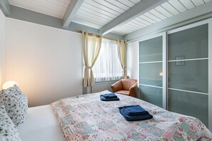 1 dormitorio, tabla de planchar con plancha, wifi gratis y ropa de cama