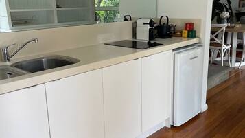 Fridge, microwave, stovetop, coffee/tea maker