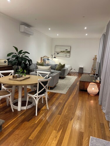 Relax in the sounds of nature. Bush walks nearby and city life at your doorstep.