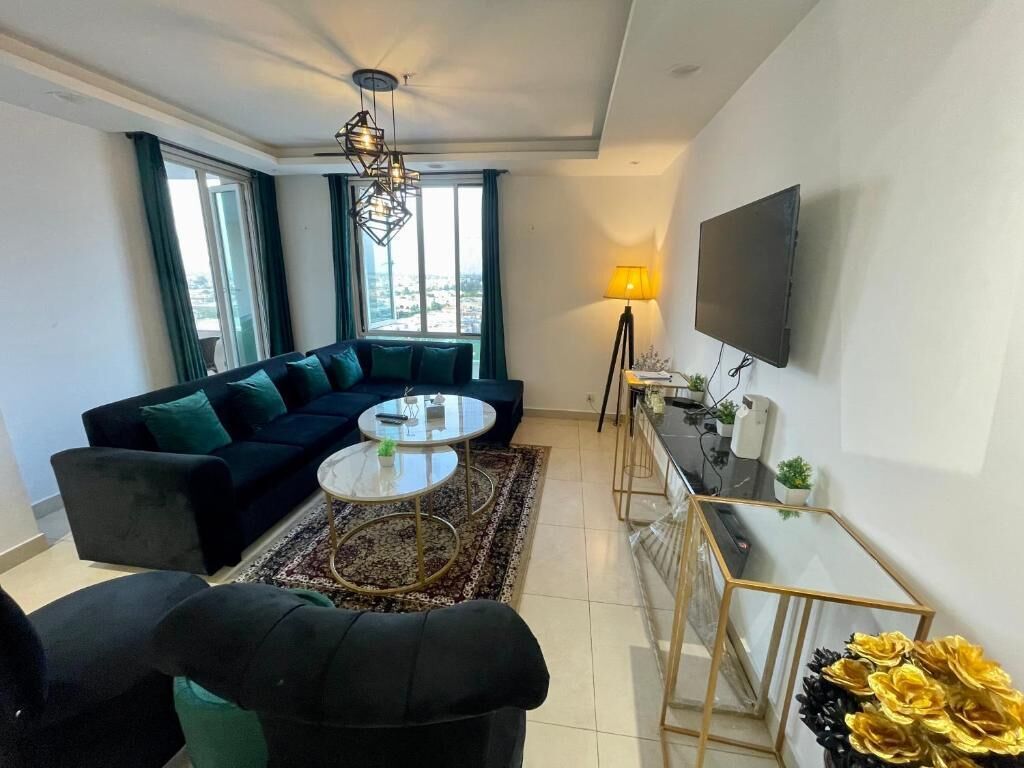 Deluxe Apartment | Living room | 32-inch LCD TV with cable channels