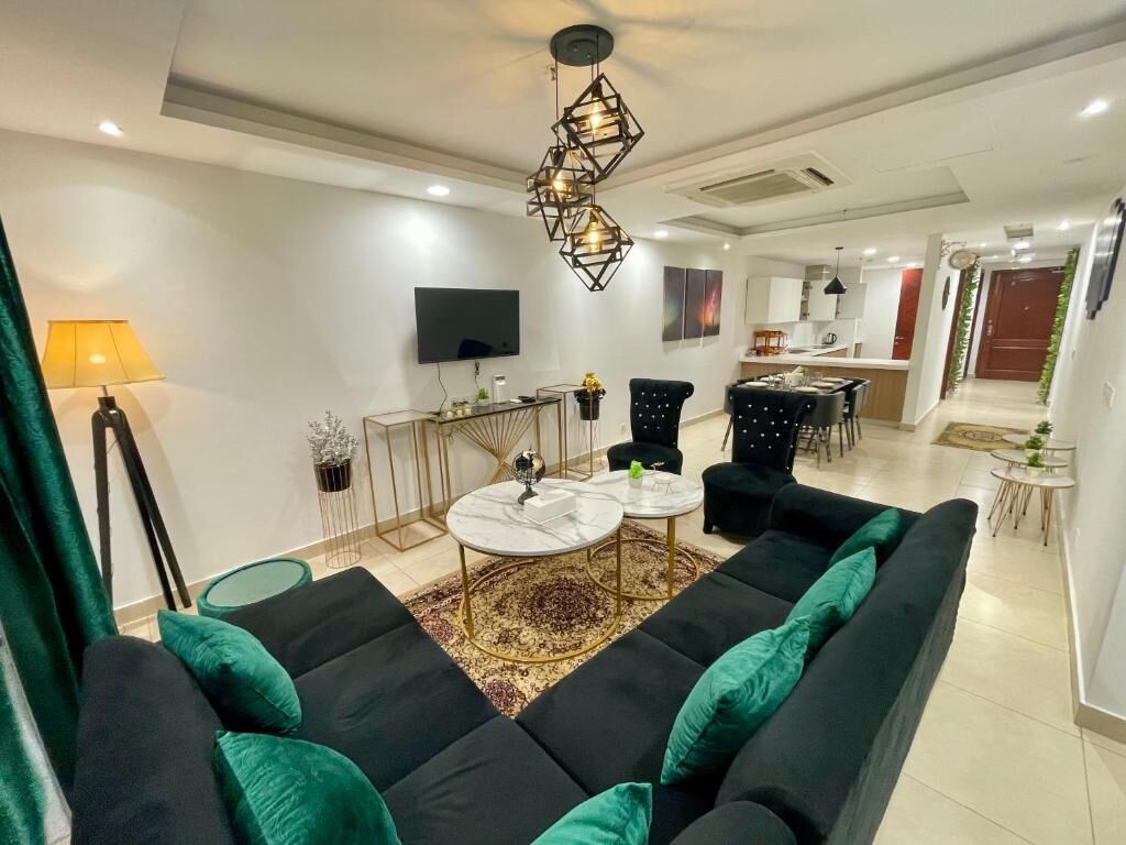 Deluxe Apartment | Living room | 32-inch LCD TV with cable channels