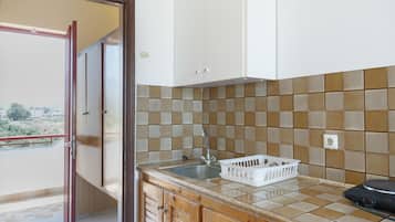 Fridge, stovetop, electric kettle, high chair