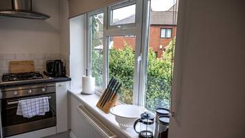 Fridge, microwave, oven, coffee/tea maker