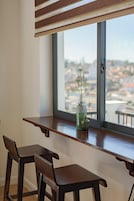 Deluxe Room, 1 King Bed, Balcony, City View | Free minibar items, blackout drapes, free WiFi, bed sheets