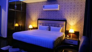 Chambre Double Deluxe | Chambres insonorisées, fer et planche à repasser, Wi-Fi gratuit