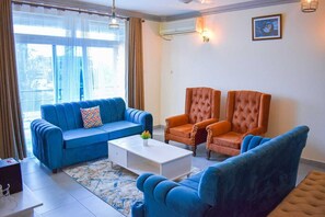 Comfort Apartment | Living area | 24-inch Smart TV with digital channels - Pavilion Suites Nyali (Mombasa)