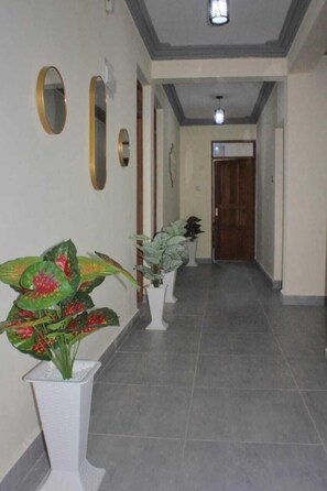 Deluxe Apartment | Living area | 24-inch Smart TV with digital channels - Pavilion Suites Nyali (Mombasa)