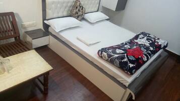 Habitación Deluxe | 1 habitación, wifi gratis y ropa de cama