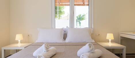 2 slaapkamers, een strijkplank/strijkijzer, gratis wifi, beddengoed