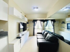 Apartment, 2 Bedrooms | Living area | Flat-screen TV