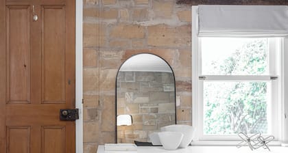 5 Minute walk into the CBD near shops, restraunts and bars.