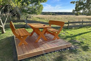 Outdoor dining - Marisol Comfortable holiday residence (Glowe, Rügen Jasmund, Ostsee)