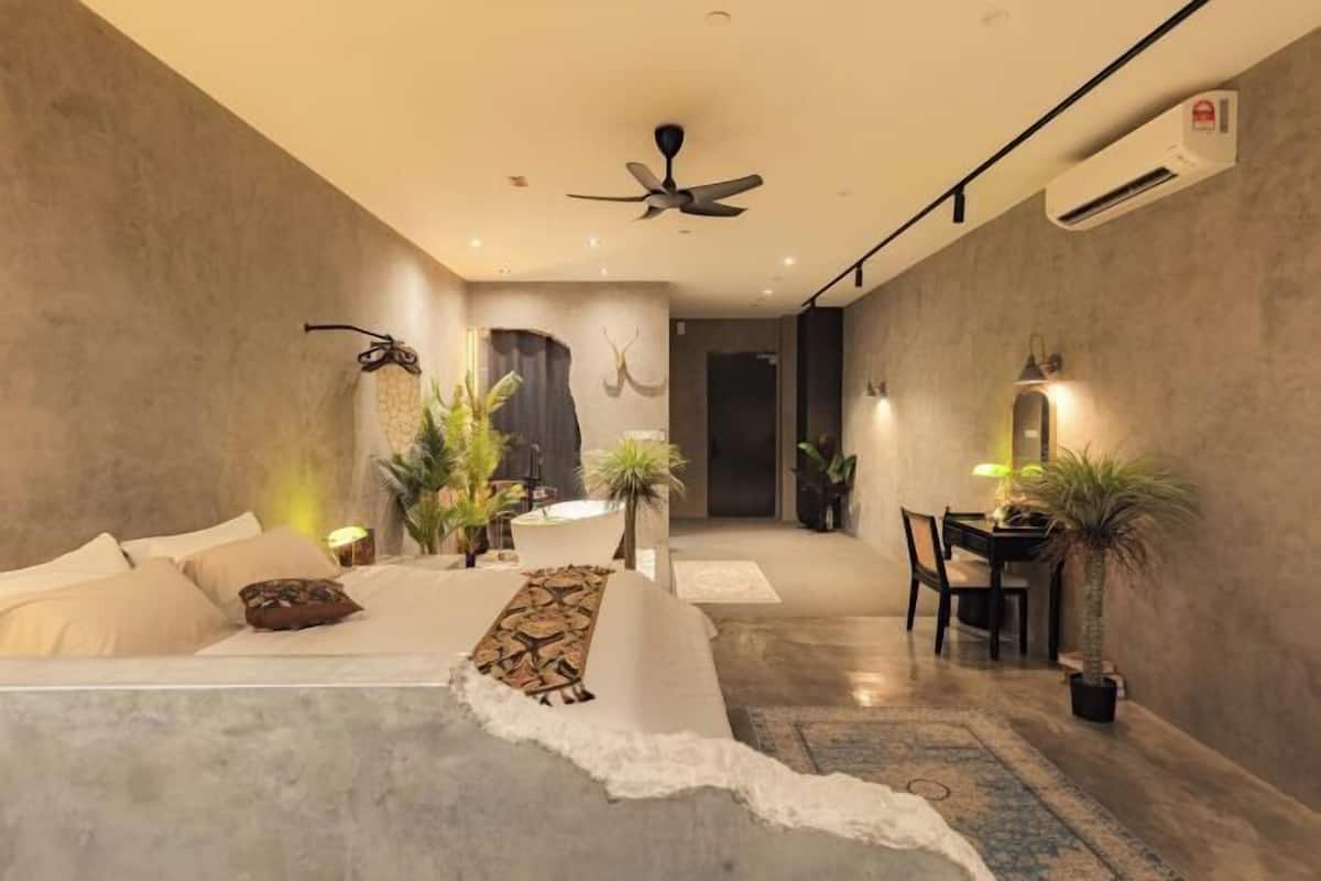 1 dormitori i espai de treball apte per a portàtils