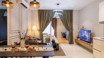 Deluxe Apartment, Multiple Beds, Balcony, City View | 1 bedroom, laptop workspace, iron/ironing board, free WiFi