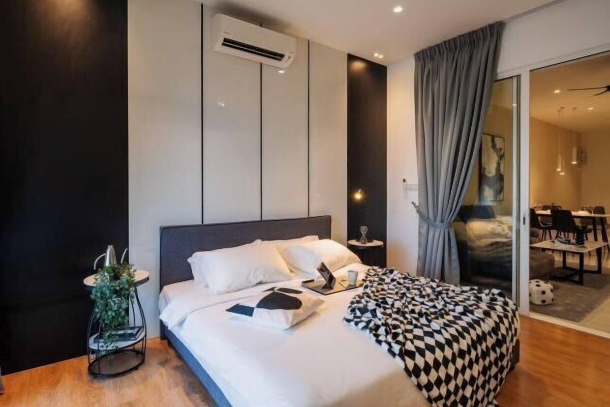 1 dormitori i espai de treball apte per a portàtils