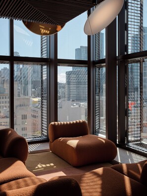 Suite, 1 King Bed | Living area | 55-inch Smart TV with digital channels, streaming services - Hyde Melbourne Place (Melbourne)