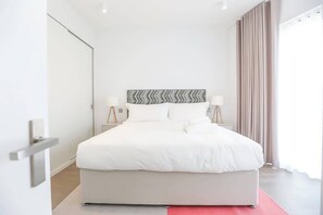 2 dormitorios, tabla de planchar con plancha, cuna de viaje y wifi