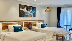 A modern hotel room with two beds, a large abstract painting, a wooden headboard, and a view of the outdoors. - Sabina Luxury Boutique Hotel & Villa (Ho Chi Minh City)