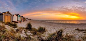 On the beach, sun-loungers, beach towels