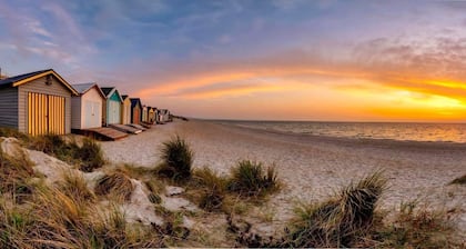 Bayside 4BR Well Equipped Beachfront Home 180° Bay Views Beach Access at Rear.