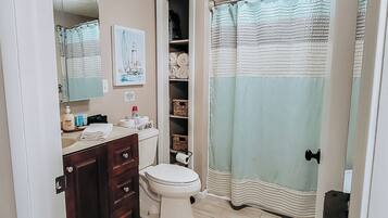 Hair dryer, towels, soap, shampoo