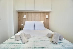 1 quarto, Wi-Fi de cortesia, roupa de cama