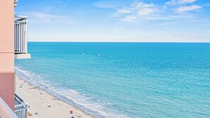 Enjoy breathtaking ocean views from the balcony with access to the beach.