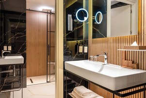 Family Room, Multiple Beds, Balcony, Garden View | Bathroom | Shower, hair dryer, slippers, towels