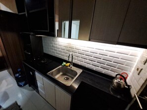 Family Suite - Capital O 93959 Apartement Gateway Cicadas By MG Property (Bandung)