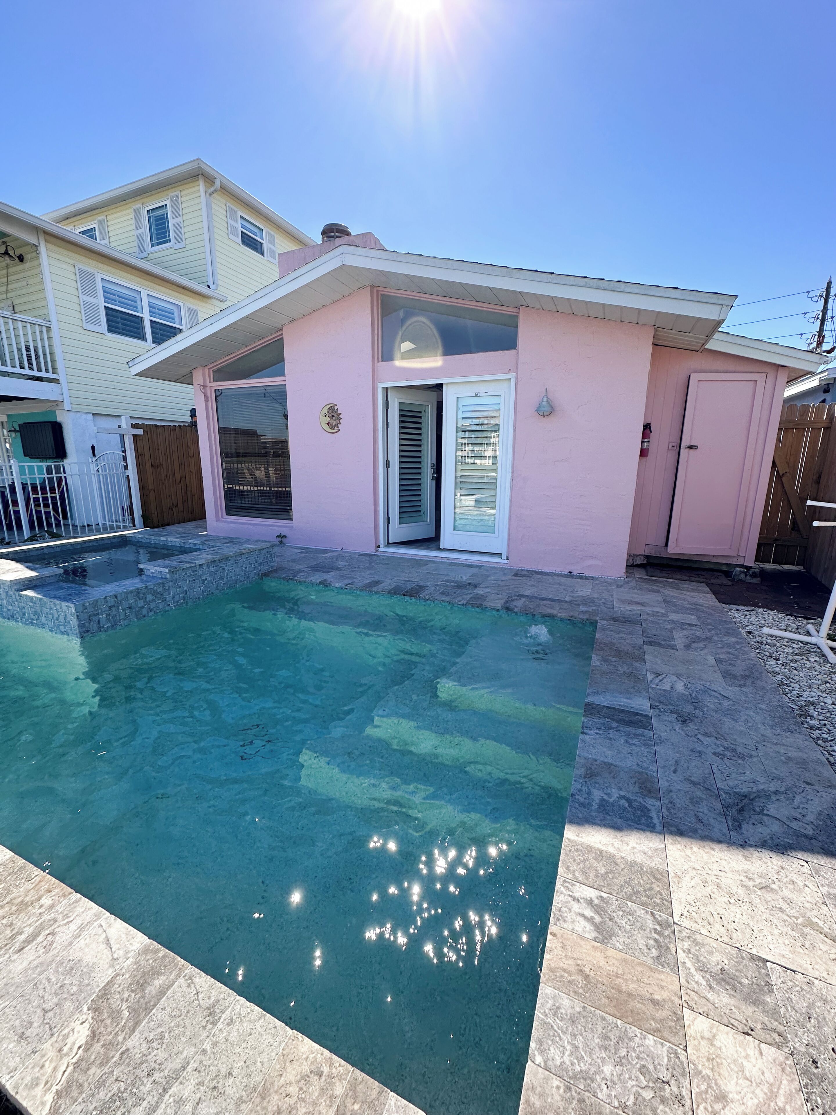 Charming 3 bedroom beach cottage on canal with pool and hot tub 