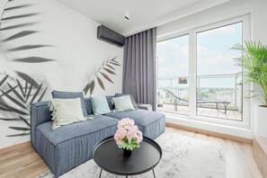 Apartamento, 1 quarto, sacada | Área de estar