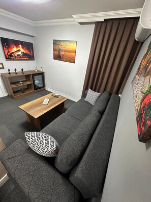 Deluxe suite | Een minibar, individueel gedecoreerd, individueel gemeubileerd