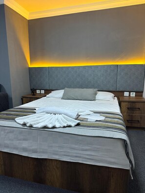 Deluxe suite | Een minibar, individueel gedecoreerd, individueel gemeubileerd