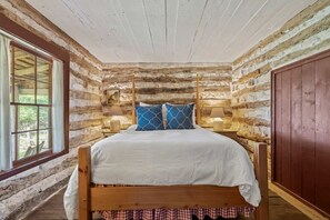 1 habitación, tabla de planchar con plancha y ropa de cama