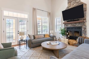 TV, fireplace - Uncorked & Untamed: Games, Flames & Mountain Fun (Sevierville)