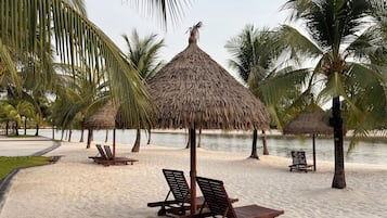 Beach nearby, sun loungers