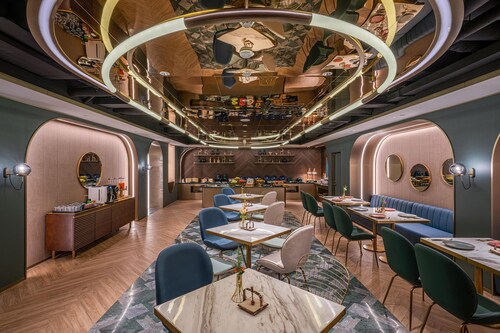 Manxin Hotel Yantai Binhai Plaza