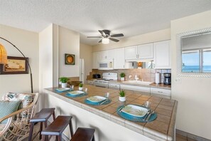 Condo, 2 Bedrooms | Private kitchen | Fridge, oven, stovetop, coffee/tea maker